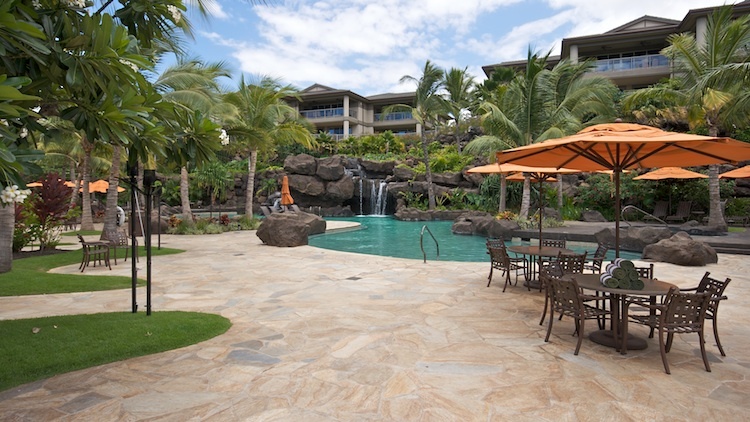 Overlooking Hoolei outdoor pool deck with waterfalls and lush landscaping