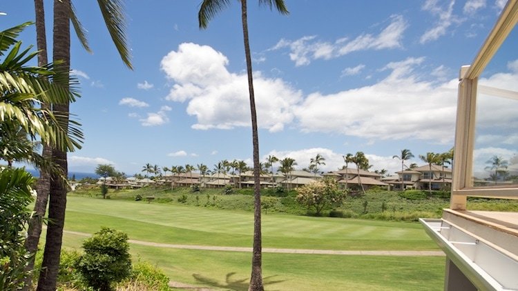 Sweeping views of the golf course from your private lanai of Grand Champions