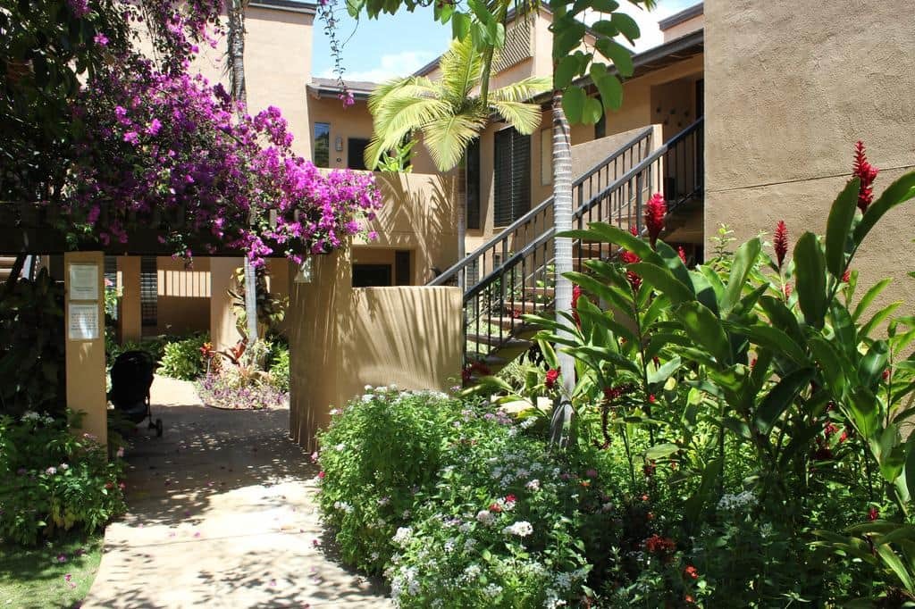 Convenient access to the second story units with well-appointed landscaped pathways