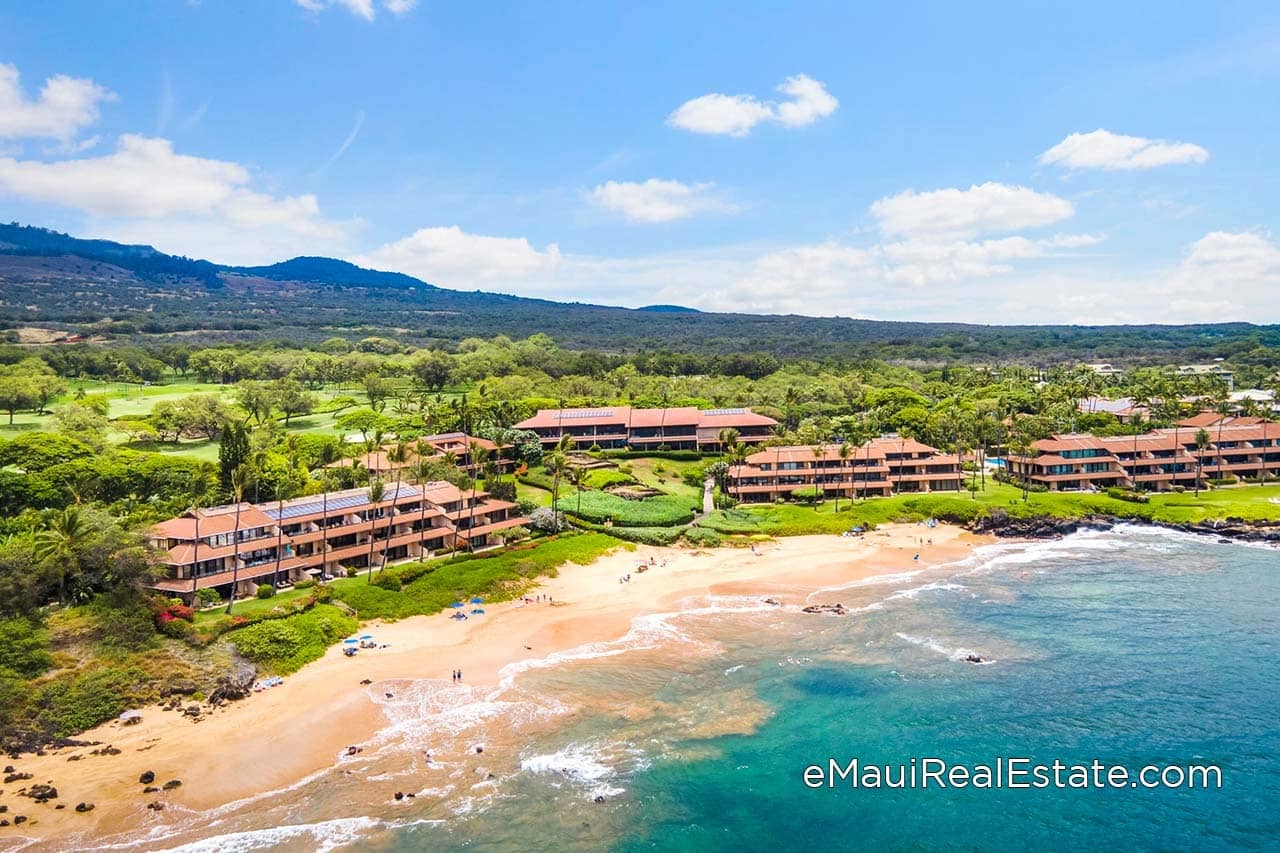 Secluded oceanfront condo community describes Makena Surf