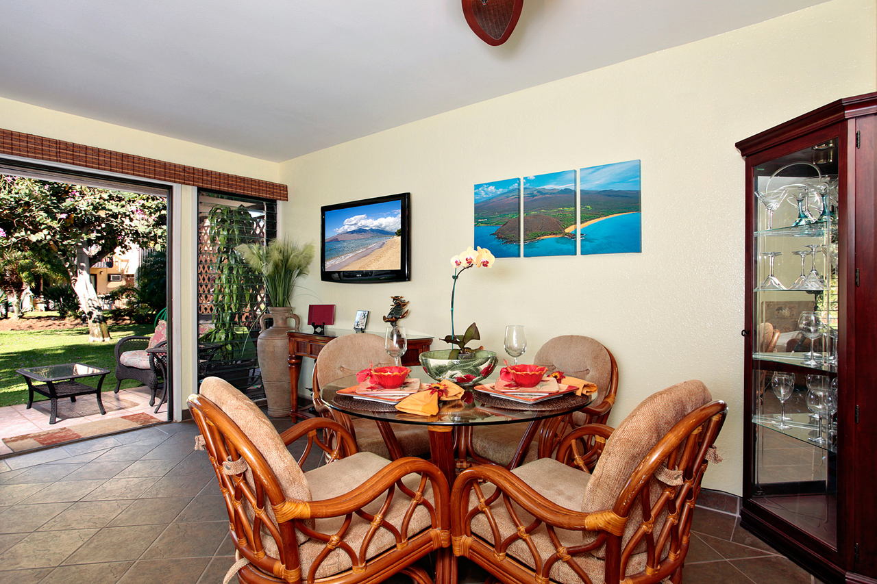 A living area with a dining table