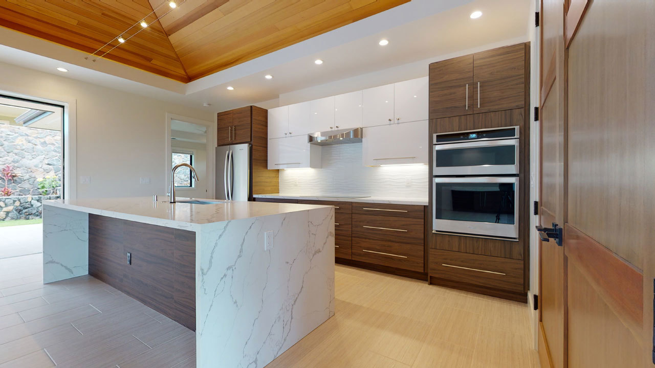 Kitchen of a new custom home in Kilohana Waena built in 2020